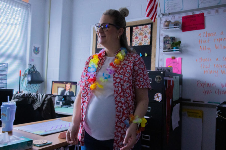 Mrs. Lentz smiles out at her class, dressed in a hawaiian theme. 