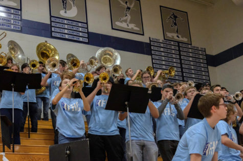The A Band members play a song to get the spectators, players, and cheerleaders moving. Their motivation was high as they promoted the school spirit their director was looking for.