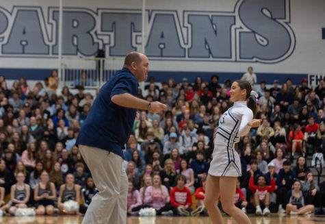 Scott Harris dances with Alice Landry during the cheer routine.