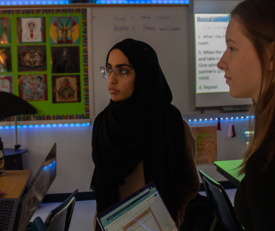 Junior Rabeea Bari interacts with other students in her Spanish IV class. Bari noticed a major difference between herself and her classmates is the holidays they receive off.