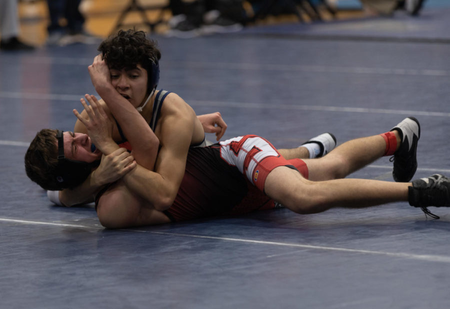 Freshman Roberto Gil Farias tries to stay on top of his opponent. 