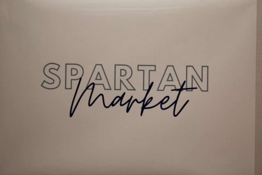 The logo of the Spartan Market form to submit items.