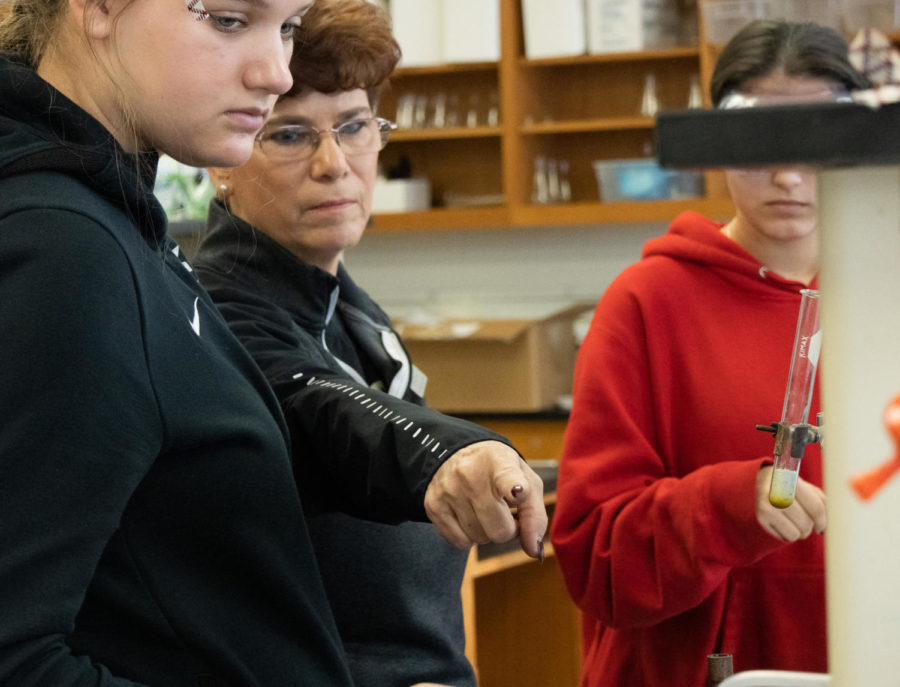 Chemistry teacher Mrs. Malkmus is directing students for a science experiment. Mrs. Malkmus was brought to FHC to replace the last chemistry teacher.