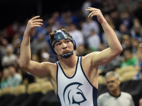 State champion wrestler, Aidan Hernandez arises the crowd after succeeding in beating his opponent. Hernandez finished his wrestling career with an 161-14 record. Paul Halfacre, Special to STLhighschoolsports.com