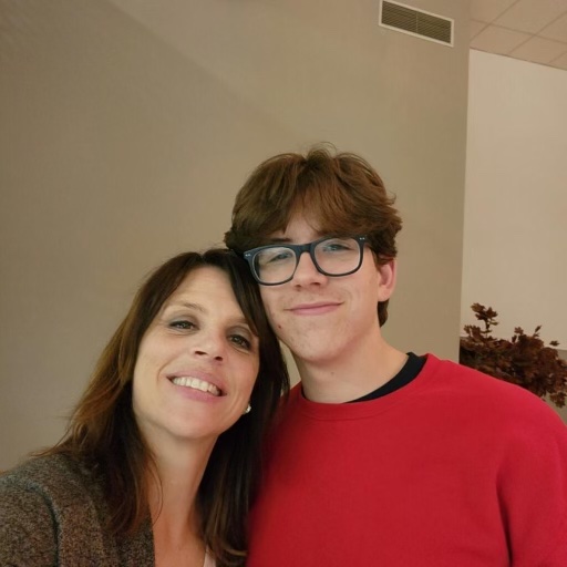 Senior Jack Patton smiles with his mom. They stand together to capture the moment at a family dinner.Photo courtesy of Jack Patton