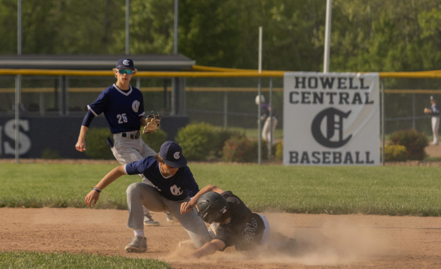 Drew Wyss applying the tag on the runner trying to steal. 