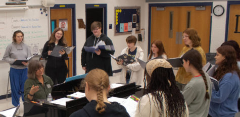Members of the Treble Choir gather around Choir Director Donna Solverud in early fall. 