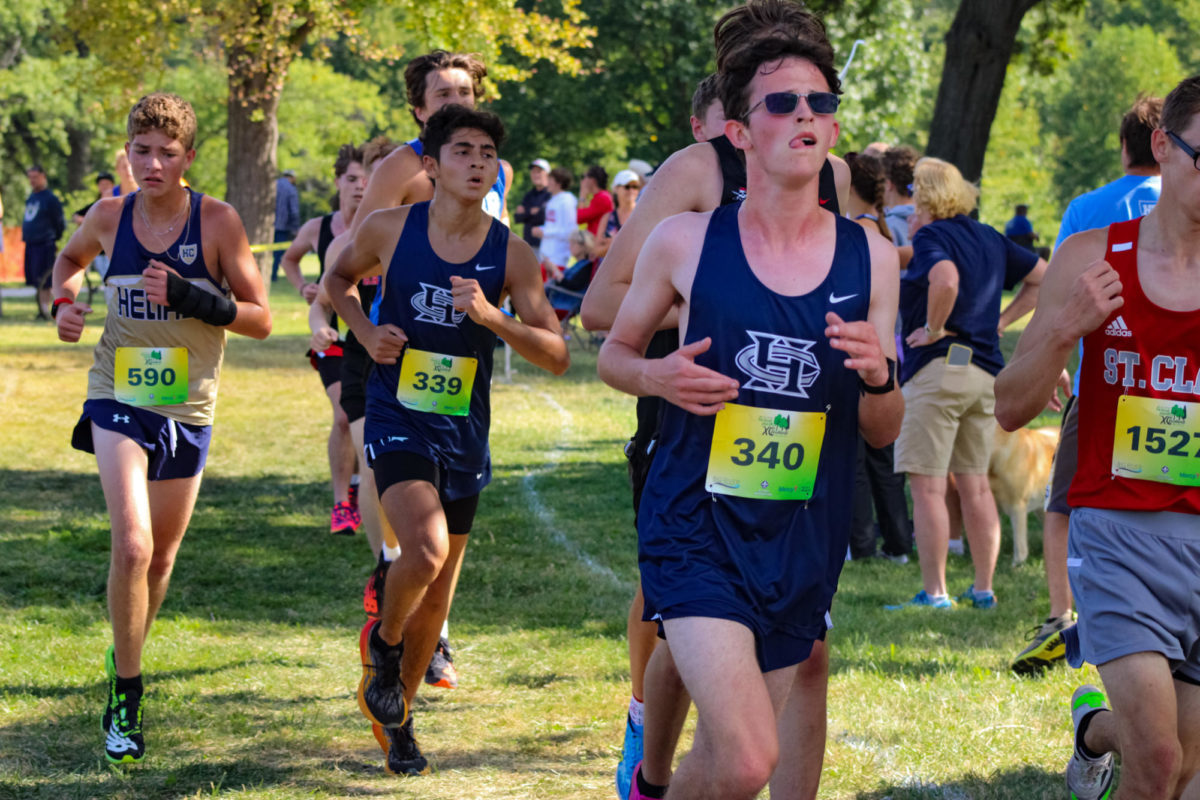 Sophomore’s Johnathan Hamilton and Roberto Gil Farias race together to help push each other