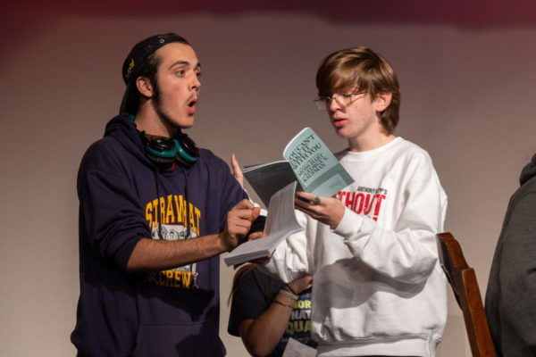 Junior Connor Becker acts alongside Junior Caleb Herschberger during a theater rehearsal. The actors have been rehearsing for the fall play for three weeks. 