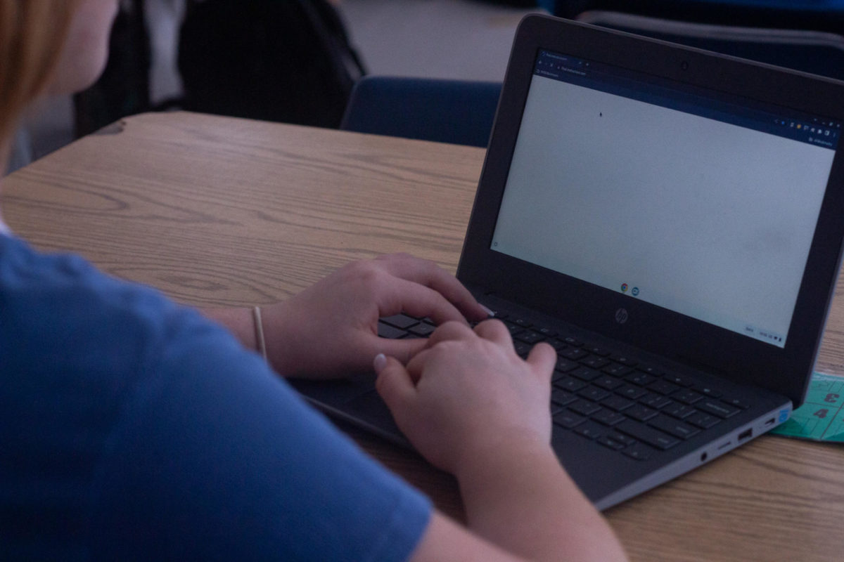 Student+in+French+class+waits+for+Chromebook+to+load.++
