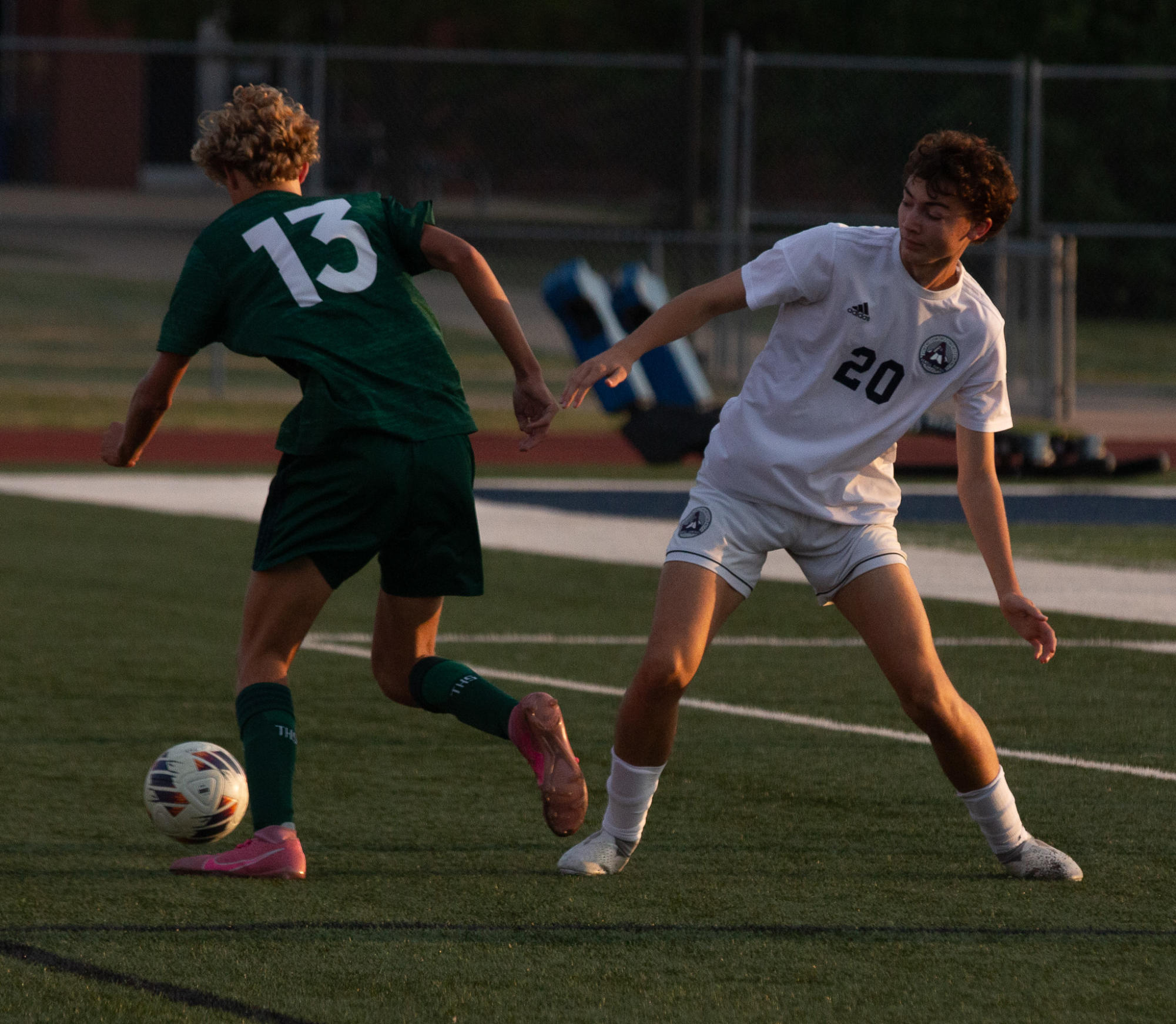 Junior Adam Doria fights to retrieve the ball from his opponent. This was before their first goal of the game so Doria was determined to keep the ball on their side.