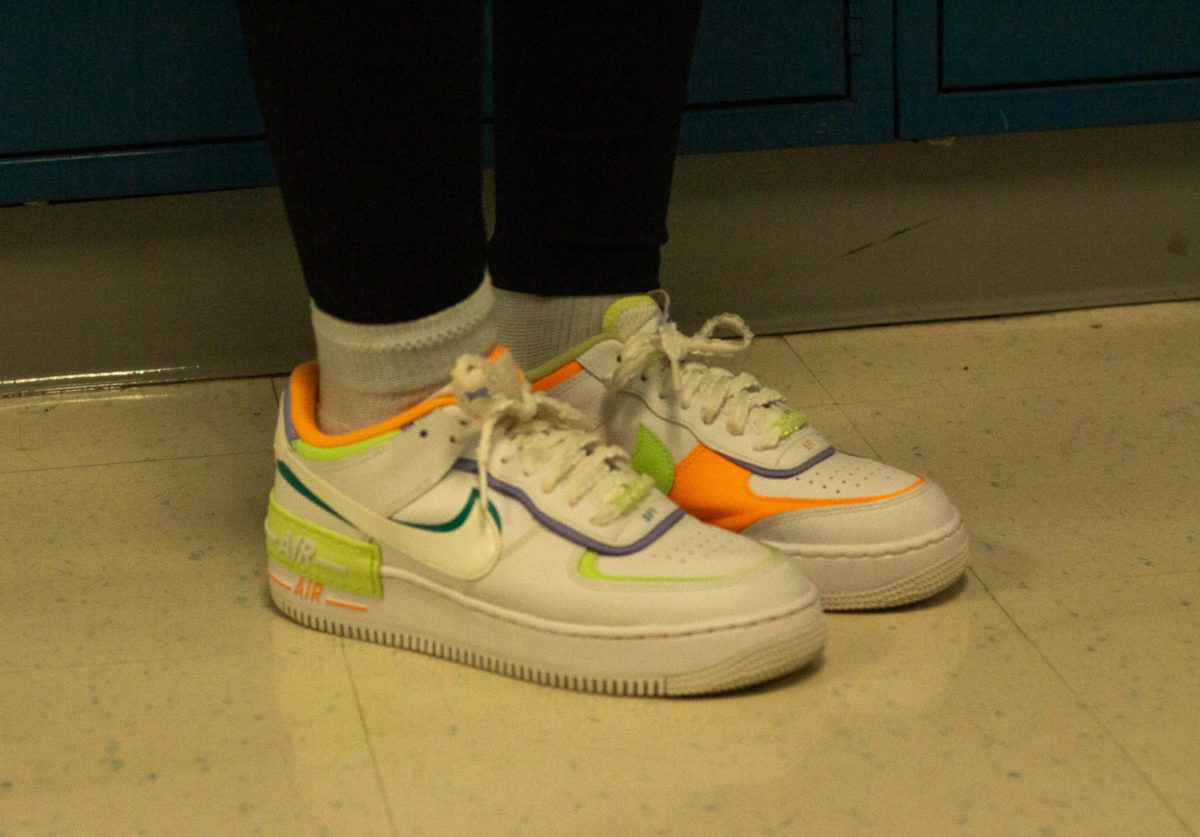 Student wears Aiforce 1s shadow shoes  in school. 