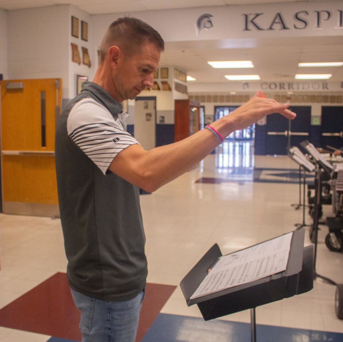 Band Director Nathan Griffin leads the Symphonic Band percussion ensemble in songs and instructs them on different sections. Symphonic Band meets in the band room during 4th hour every day. 