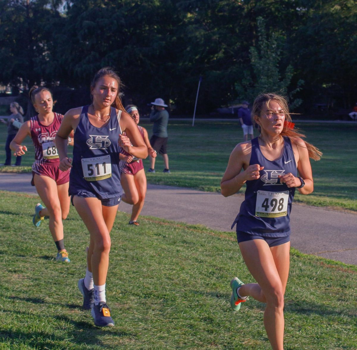 Ally Brower and Layla Sanchez keep a steady pace as they make their way across the track.