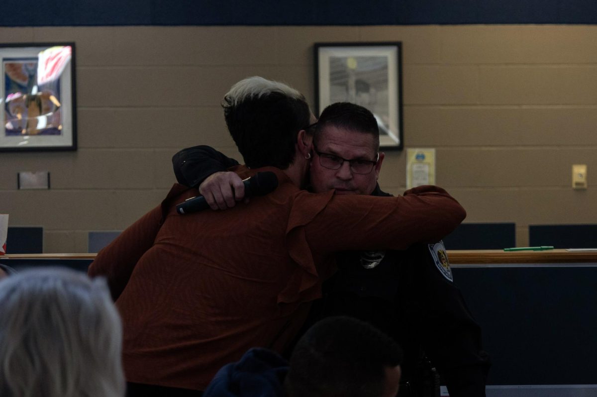 Officer Inserra and Principal Dr. Leake hold each other in a warm embrace. The two had only worked together for a year, but that doesnt change all of the memories made alongside the two.