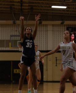 Freshman Jayla Robinson aims herself toward the basket and shoots. This game took place on February 6th and was against the Francis Howell Knights.