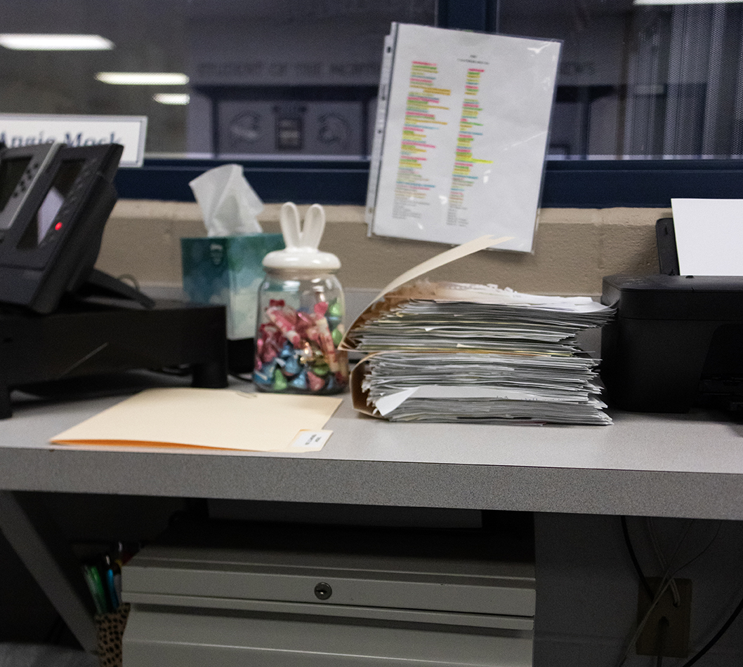 The folders in attendance overflow with the plethora of new documents the office is required to fill out.