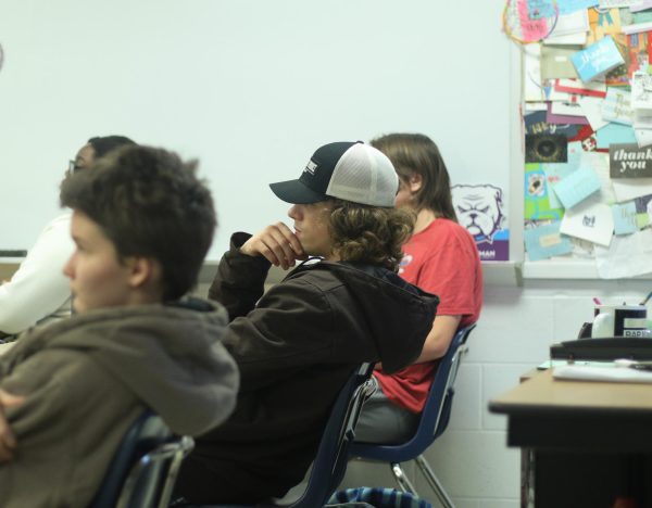 Sitting in contemplation, senior Ryan Blanchard listens to Mr. Beckmann speak during in class. Contemporary Issues offers students an outlet to learn and speak about pressing issues.