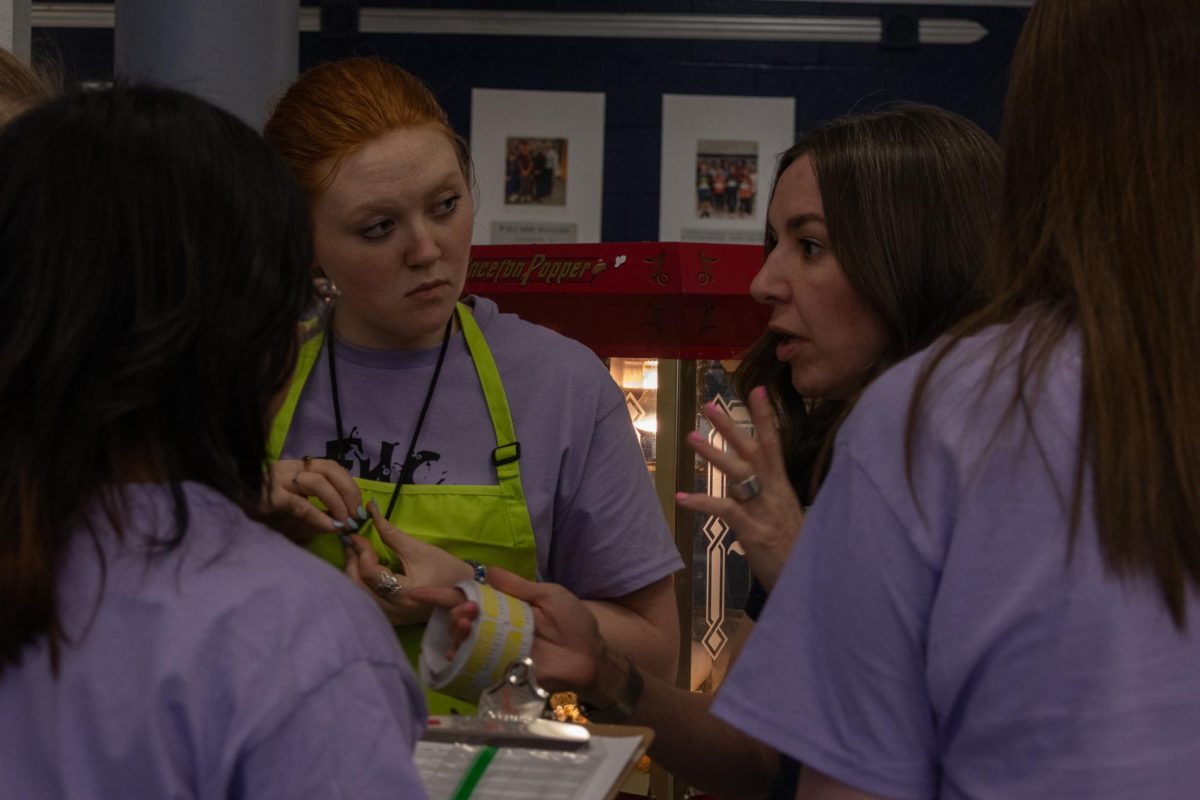 Junior Aubrey Simpson listens intently to Mrs. Clayton's instructions.  