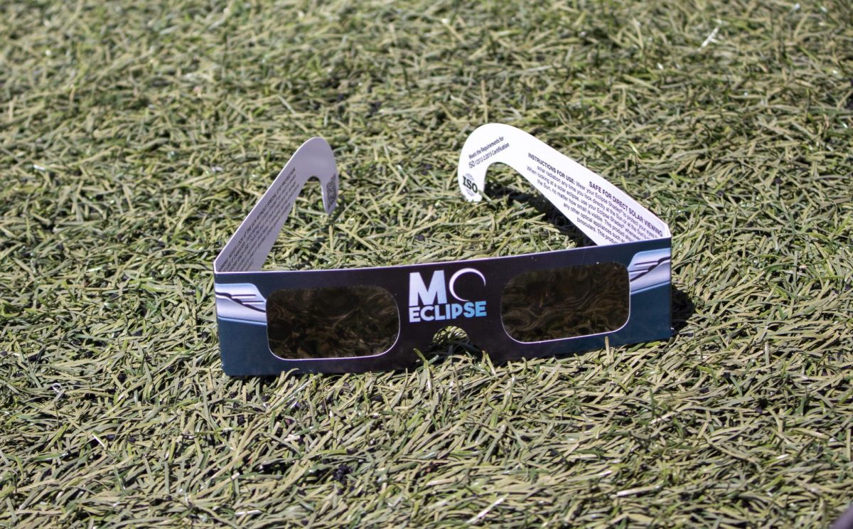 A pair of glasses lay on the grass. These district approved glasses are the ones worn during the eclipse, making sure students can responsibly watch a show.