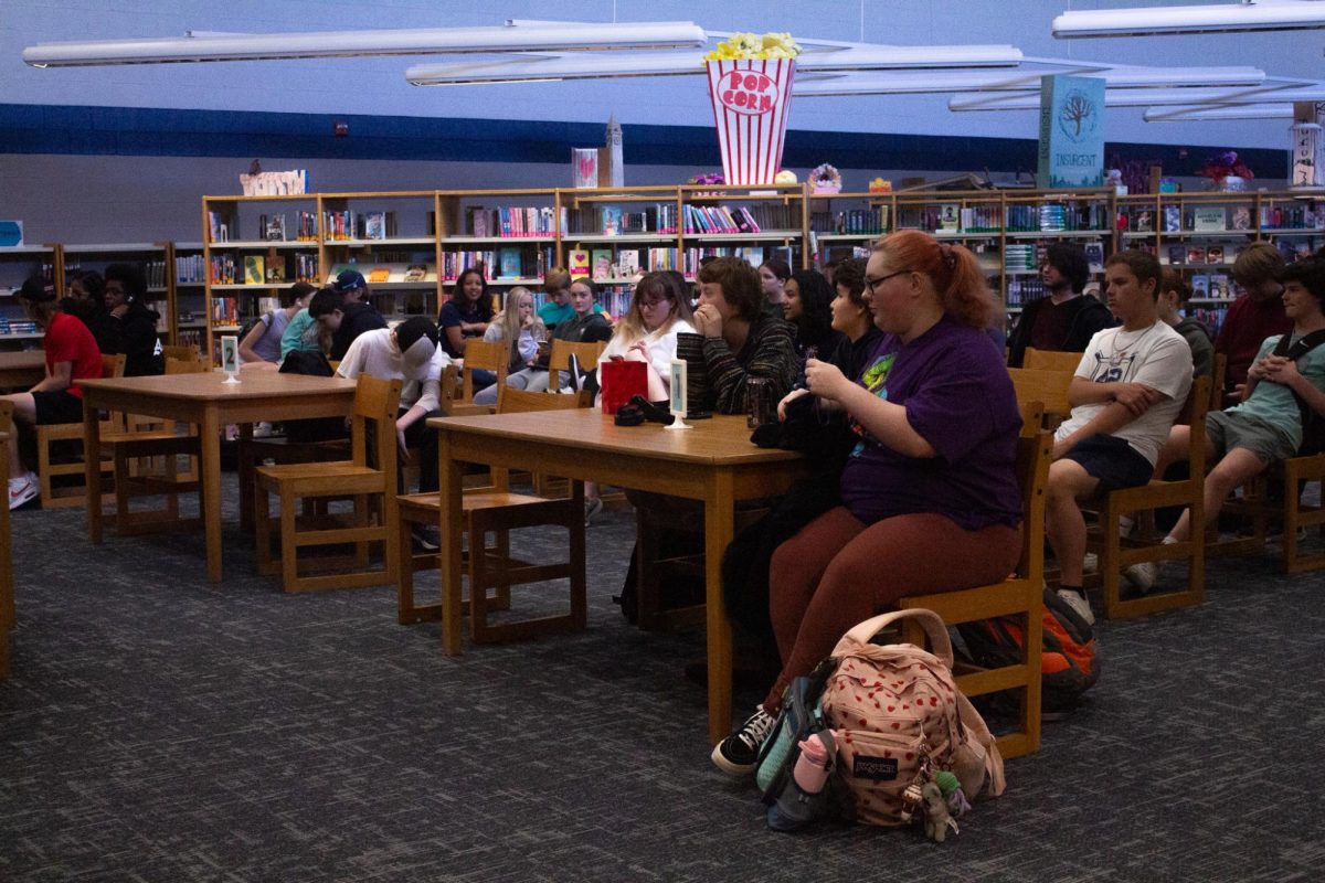 Students listen carefully, taking note of Walsh’s advice.
