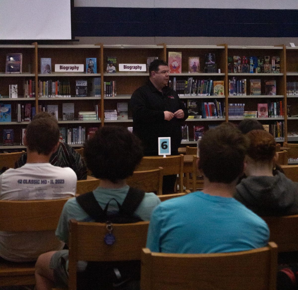 Walsh asks the crowd for any additional questions at the end of his presentation.
