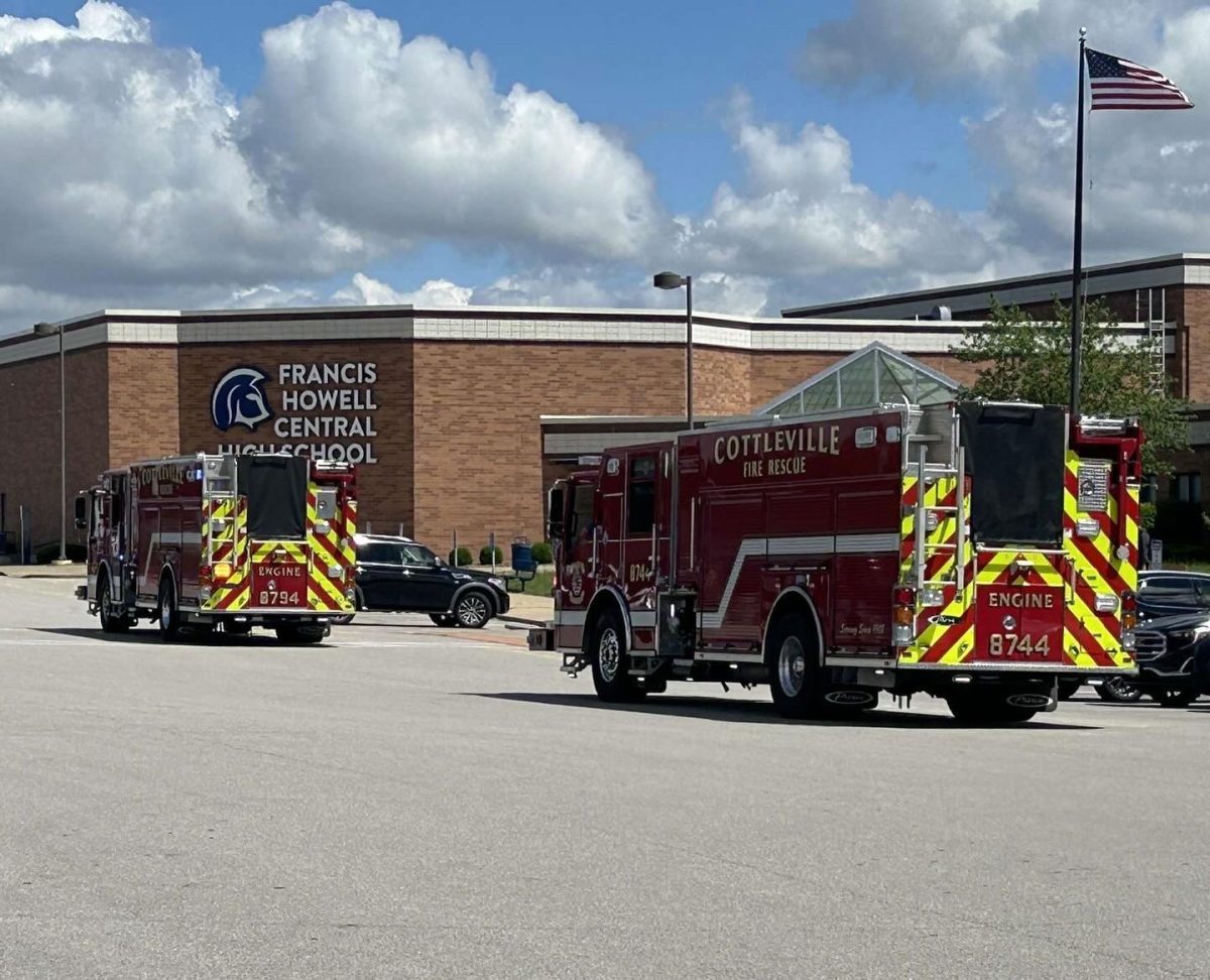 Two Cottleville county fire trucks in front of the school responding to the faulty alarm that was tripped on Friday May 10. The two trucks arrived very quickly, within 5 minutes, so in the event of an actual fire, potential damage would be minimal, and the student body wouldve been safe, as they evacuated very quickly. 