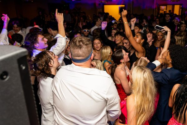 Students gather on the dance floor at FHCs 2024 Prom. As the school year comes to an end, juniors and seniors alike join to celebrate at the yearly dance.