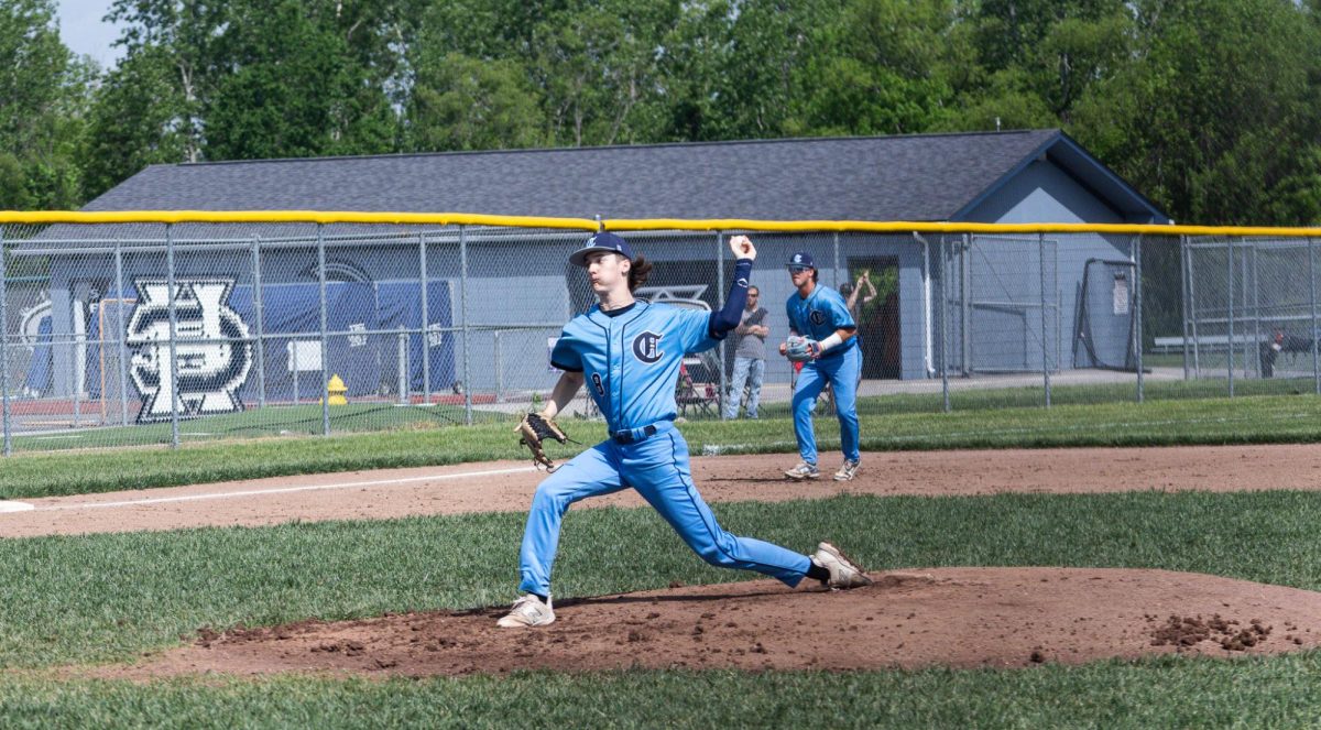 Junior Sam Mueller throws a pitch to homebase where the batter waits during the Varsity vs Eureka game on May 4.
