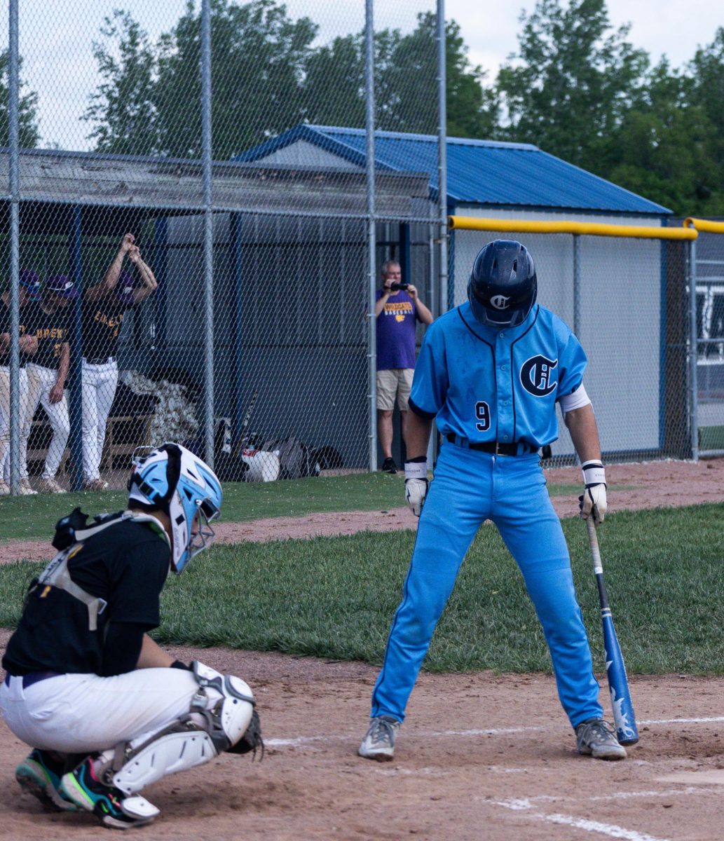 Sophomore Drew Wyss looks down at the dirt before he bats at the Varsity vs Eureka game on May 4.
