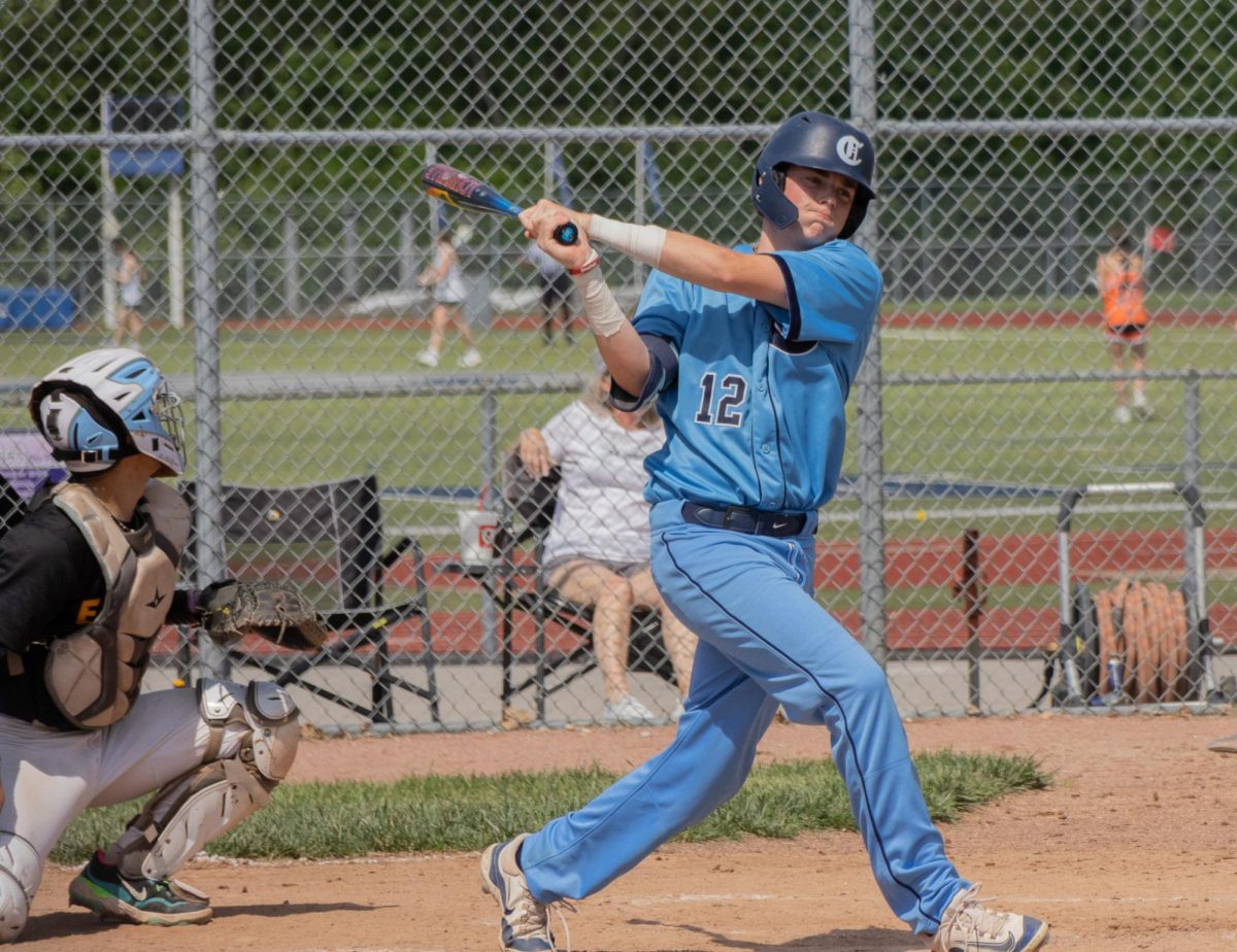 Junior Tanner Delcourt swings at a ball thrown by the opposing team’s pitcher ending in a foul ball on May 4 at the Central vs Eureka game. 