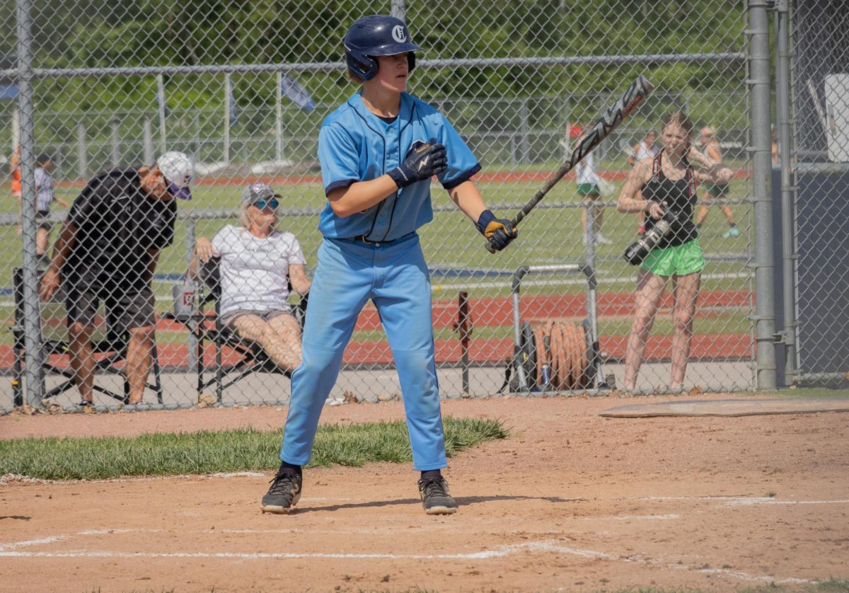 Sophomore Chase Radeke does his pre-batting ritual before he is pitched the ball on May 4 at the Central vs Eureka game. 