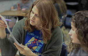 On Feb. 5, Mrs. Emily Harris reviews a student's mastery check with them. She then explains to them about the questions that they missed and why.