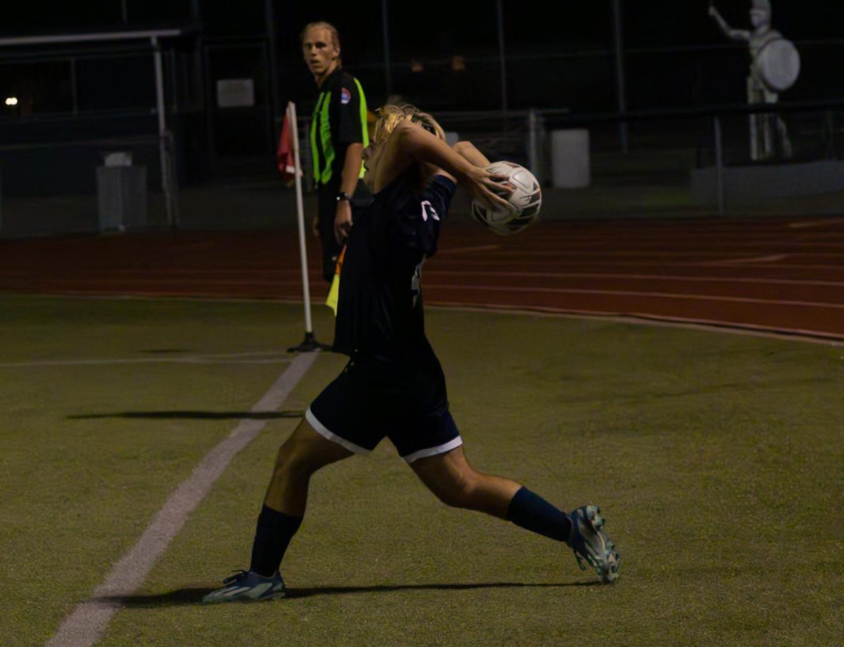 On Sept. 10 junior Braden Harton throws the ball to his teammates that are near the goal. At the game versus Francis Howell North, Harton hoped the pass would connect with one of his teammates so they could get a goal. 
