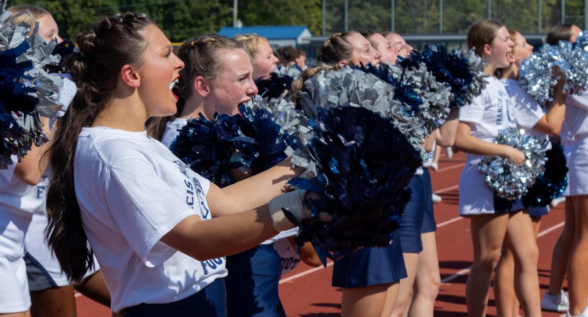 Junior Marion Rulo, along with the rest of the juniors on the varsity cheer squad, lead their grade level in the “FHC Say What” chant. At every pep assembly, the different grade levels battle each other to see who is the loudest. 