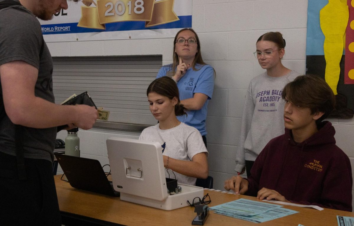 Ella Rice and other Student Council members are selling Homecoming tickets during lunch. The dance tickets are sold during lunches, before, and after school. 