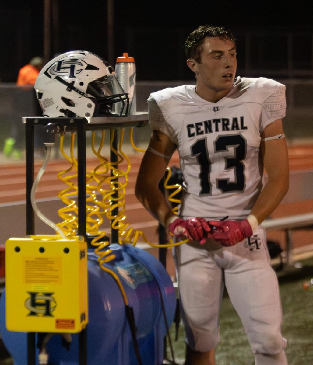 Senior Chase Kreder stands next to the water jug as he catches a breath. It’s important that the boys stay hydrated during their action-filled night.