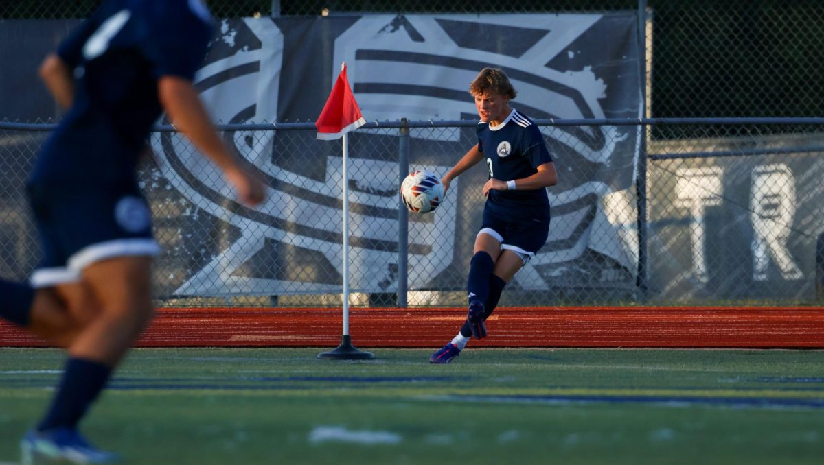 The ball had just gone out of bounds this time near Central’s own net. Cooper Troha kicks the ball in an attempt to kick to a teammate who can bring the ball to the other end.