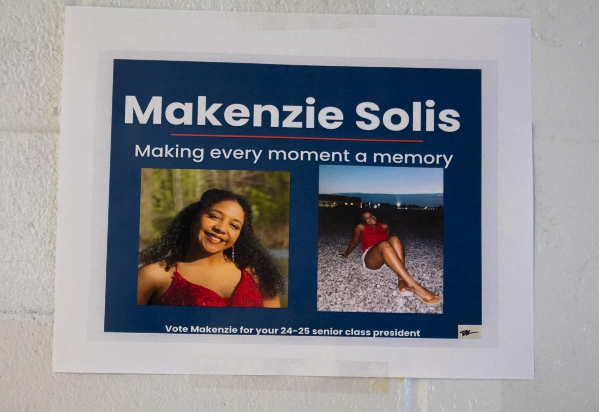  Solis' campaign poster, one of many, hangs in the English hallway. Smith tore down some of these posters, earning her her first behavior detention. 