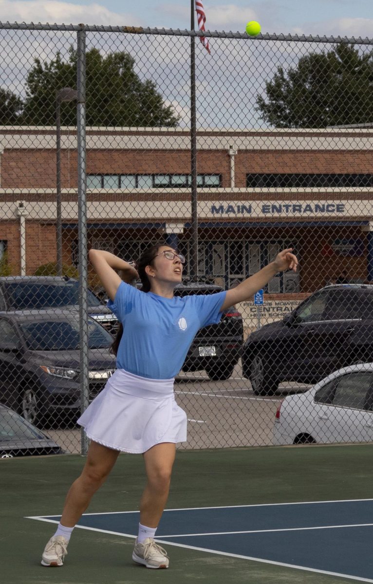 Senior Nadia Manushev lunges towards the ball for her serve. She successfully returned it to the opposing team’s side of the net.
