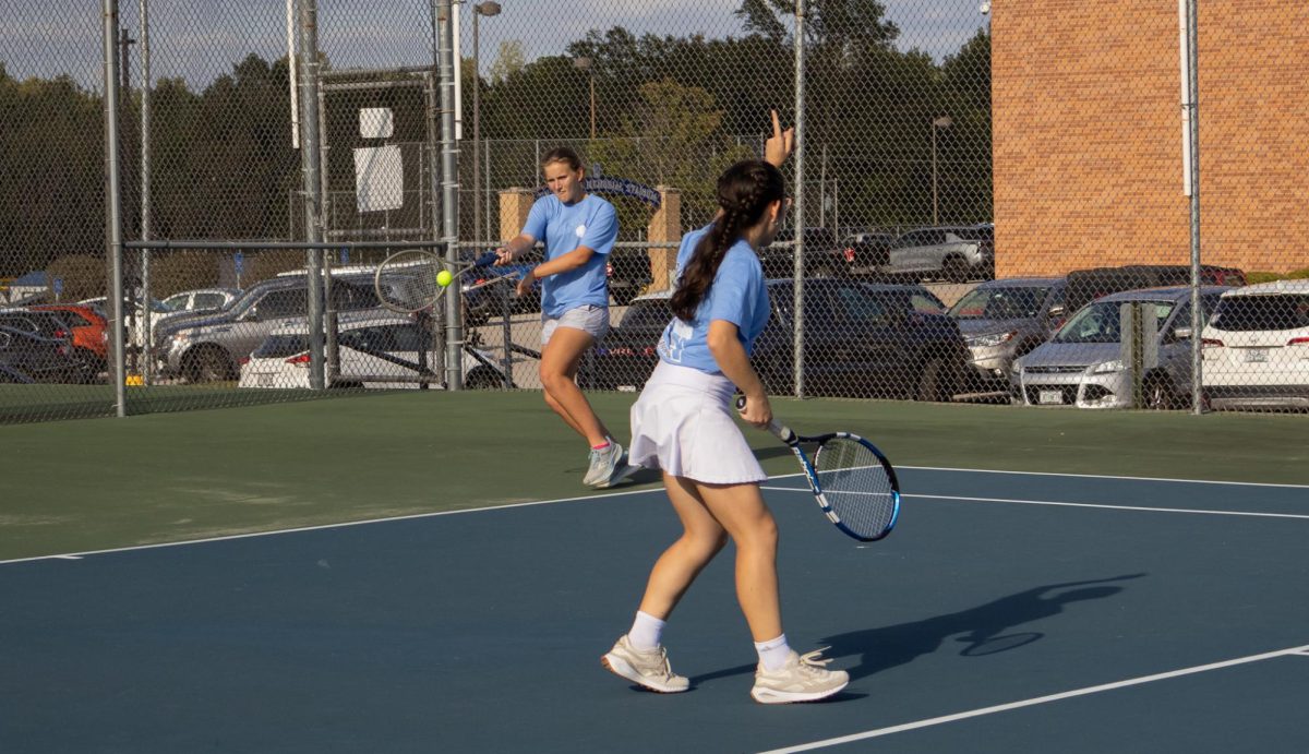 Sophie Rosser and Nadia Manushev communicate their plays. Since this was their first time playing as doubles partners, communication was especially important.