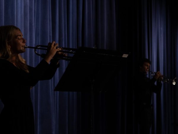 As junior Sophia Bommarito blows into her trumpet, others in her group synchronize with her. The melody they played was “Autumn Leaves” by Johnny Mercer.