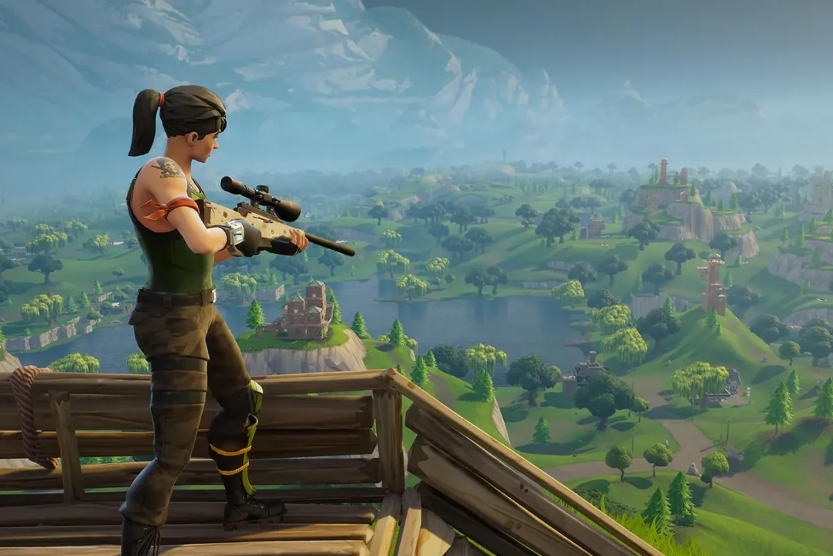 Fortnite Chapter 1 default skin holding a bolt-action sniper rifle, in its original ascetic design, watching over the original Fortnite season map. Chapter 1 Reboot OG Fortnite will be coming back for the second time since 2023 on Dec 6. Courtesy of Epic Games