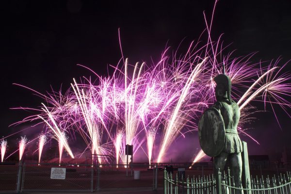 The Spartan statue looks onward at the senior lock-in celebration fireworks in the field in June 2016. The New Year is a moment of inspiration for the entire community, students and staff. Photo courtesy of FHC Publications.