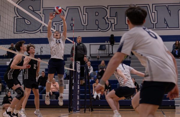 As senior Chase Williams sets the ball, his teammates prepare for a kill. The Lafayette players watched closely to prepare for the spike that came from the other players. 

