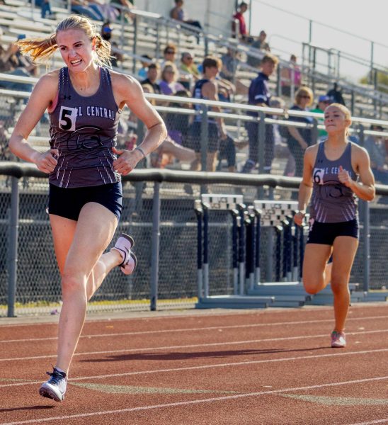 Hannah Halterman fights for first place, pushing herself until she crosses the finish line. After Halterman completed the race, Coach Kurt Kruse congratulated her on the win.  