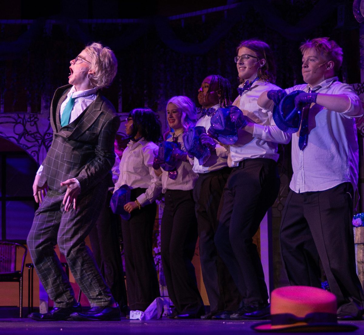 During The Spotlight Players’ production of Twelfth Night, freshman Jack Christlieb performs his solo while standing in front of his fellow cast members. Christlieb portrayed a narcissistic character and imagined himself as someone above his station.