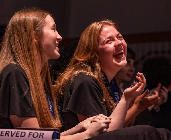 After the underclassmen’s dedicated performance, senior Abby Myers sheds happy tears with her friend junior Sarah Turner. The performance was a surprise and shocked all of the seniors.