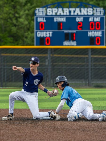 On second base, sophomore Jack Getgood catches the ball and tags the base runner from the opposing team. Although he tagged him, the umpire called the play safe, putting the Spartans on high alert that they were about to score.
