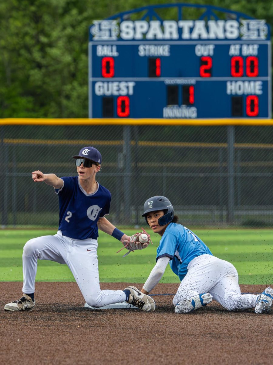 On second base, sophomore Jack Getgood catches the ball and tags the base runner from the opposing team. Although he tagged him, the umpire called the play safe, putting the Spartans on high alert that they were about to score.
